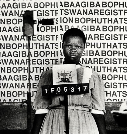 Woman being photographed for her reference book in Boputhatswana